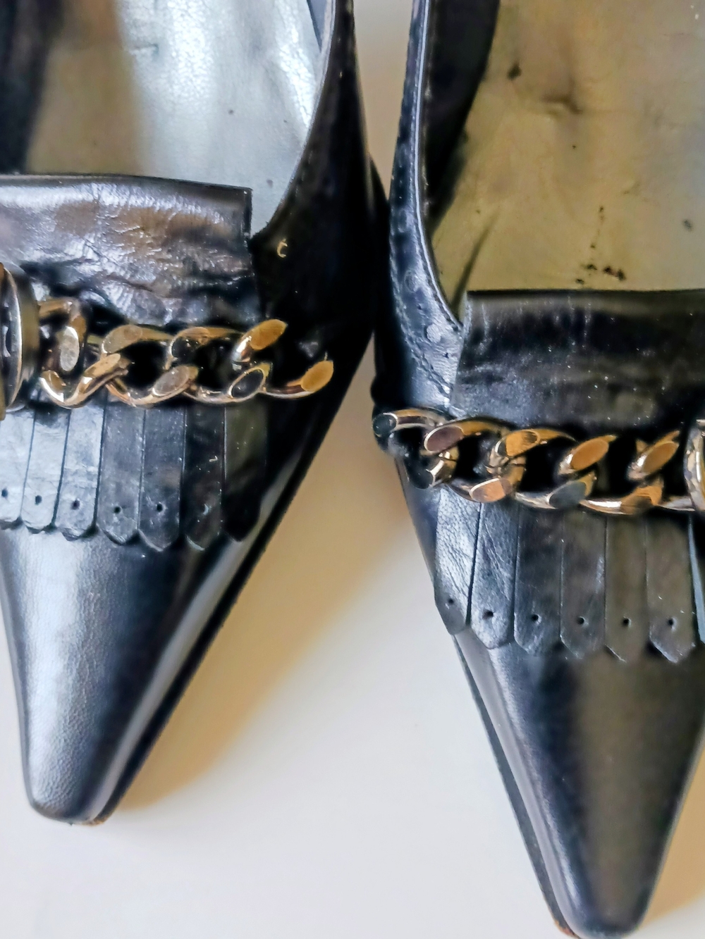 Stuart Weitzman Classic Black Pointed-Toe Loafers with Chain Accent